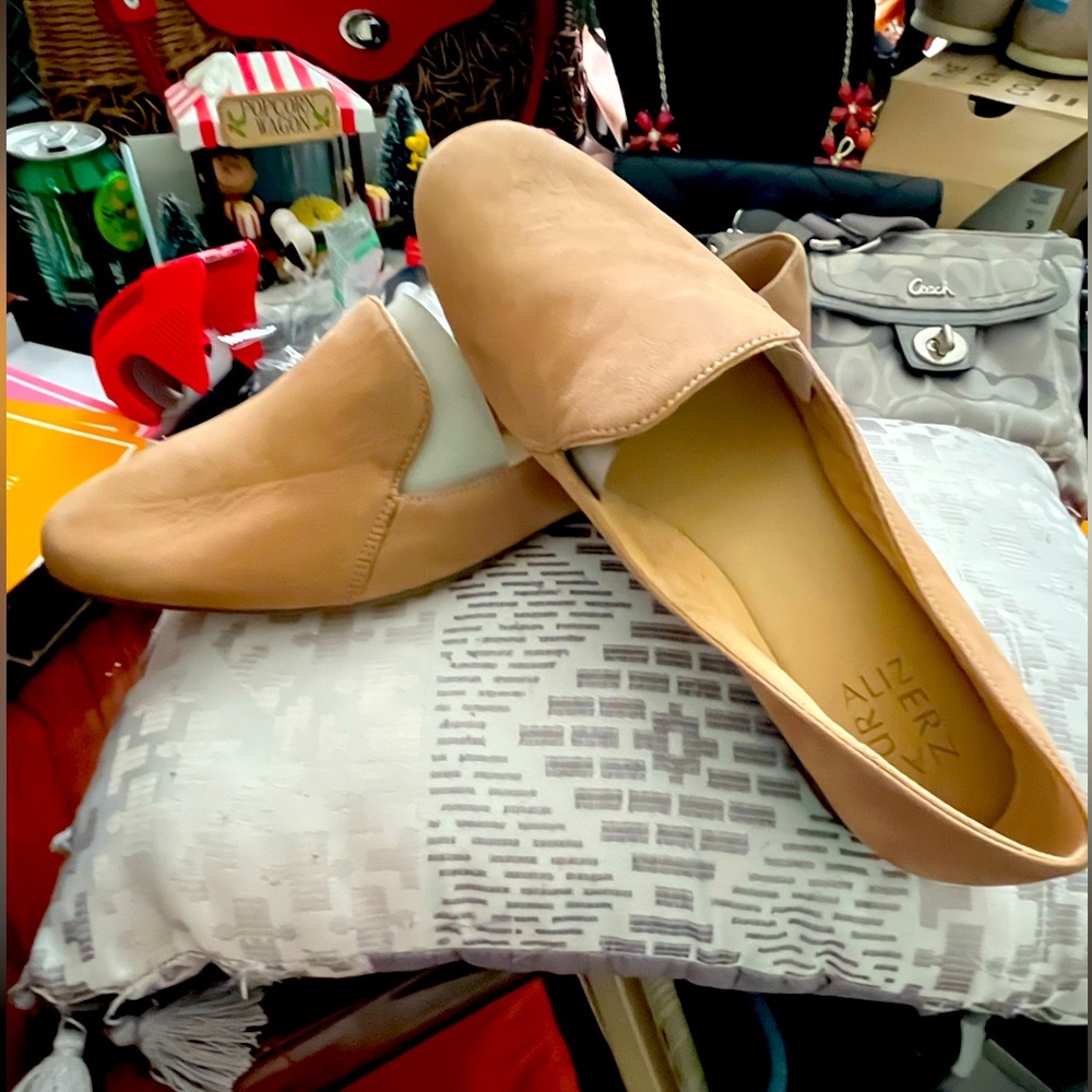 Brand new without tags Natural flats tan in color
